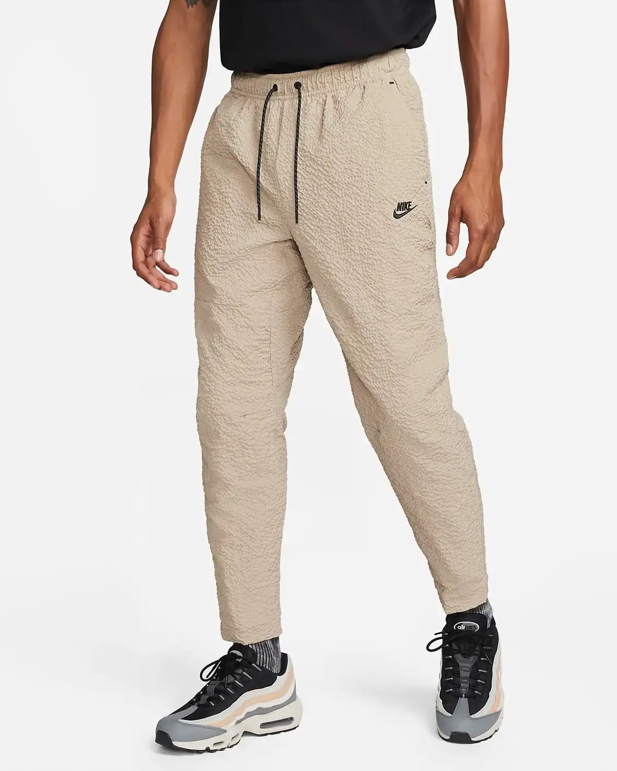 Брюки чоловічі Nike M Nsw Te Lnd Wvn Jggr Snl