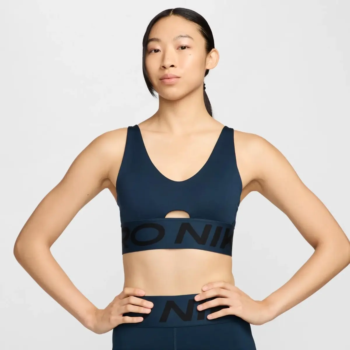 Спортивний топ жіночий Nike Np Indy Plunge Bra Bold