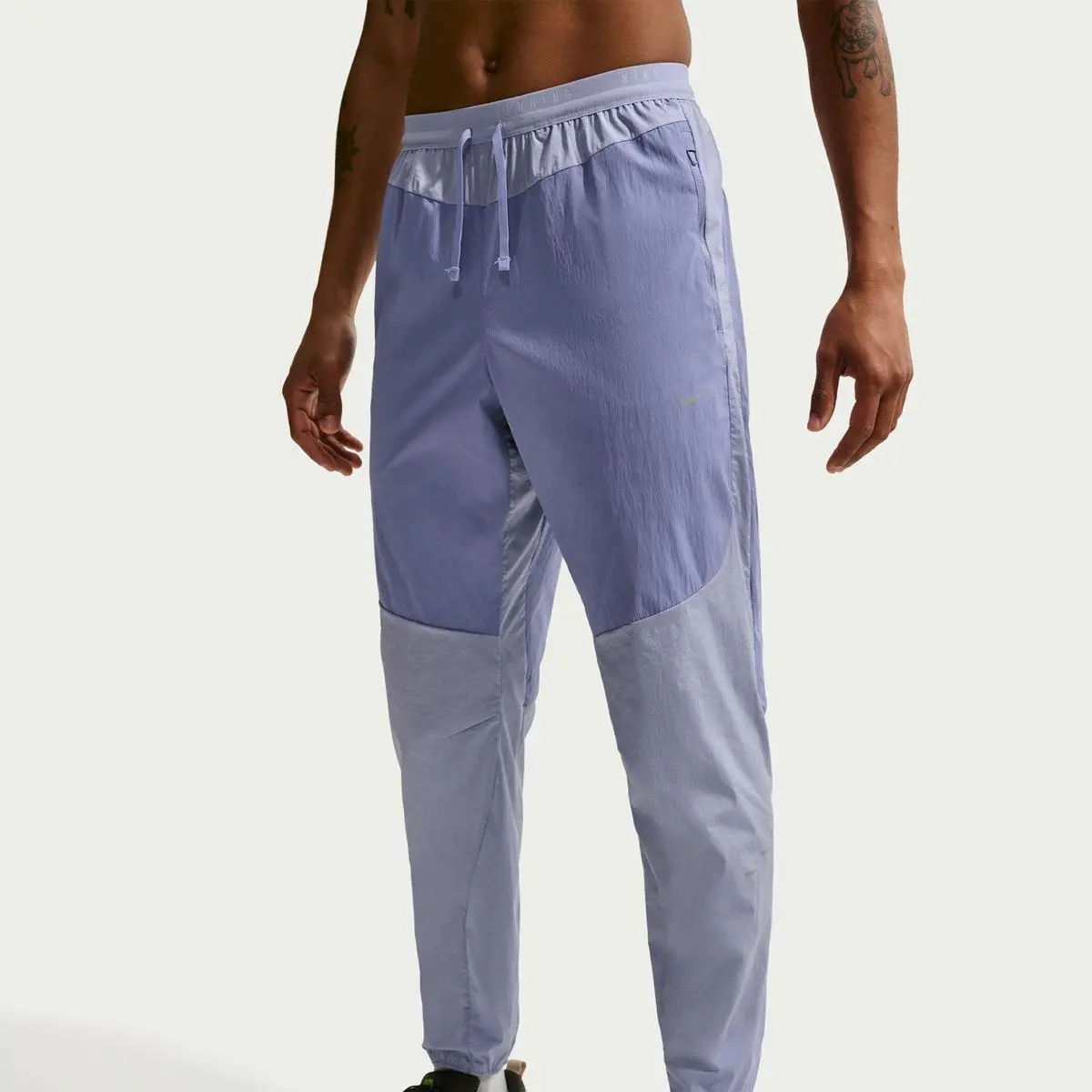 Брюки чоловічі Nike M Nk Rpl Stride Nvlty Wvn Pant