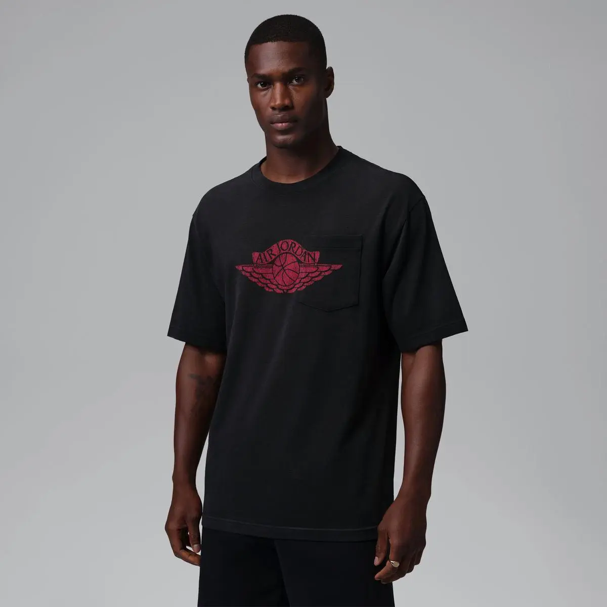 Футболка мужская Jordan Flight Essentials 85 Woven Pocket Ss Crew черная IO2084-010