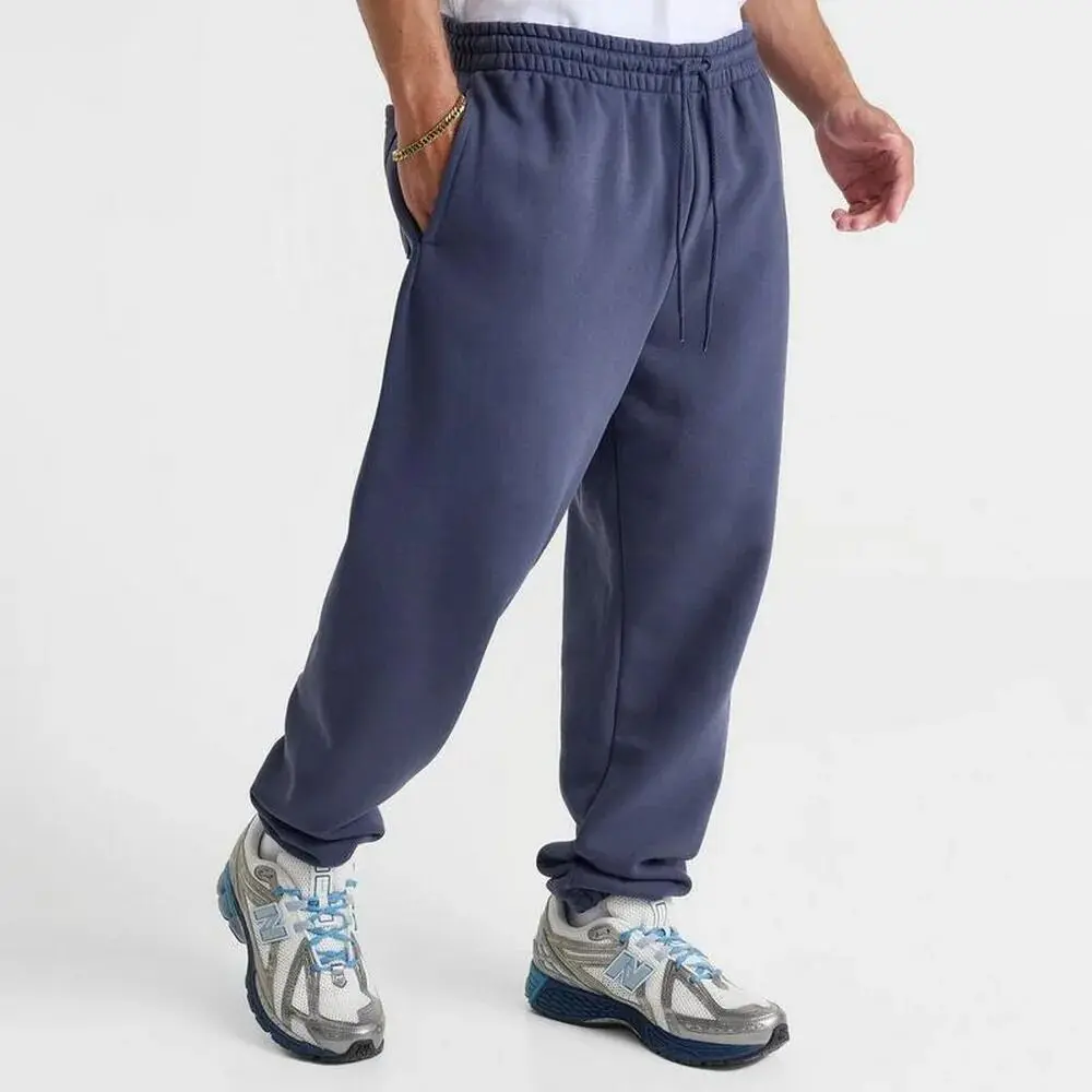 Брюки мужские New Balance Rotation черные MP51616